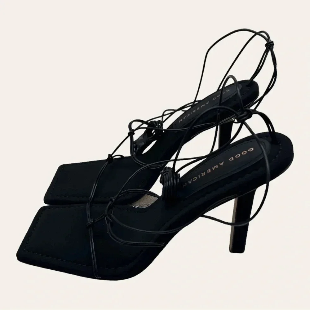 0203. NEW IN BOX GOOD AMERICAN CAGED SLANTED SANDALS BLACK IN COLOR‎ SIZE 9